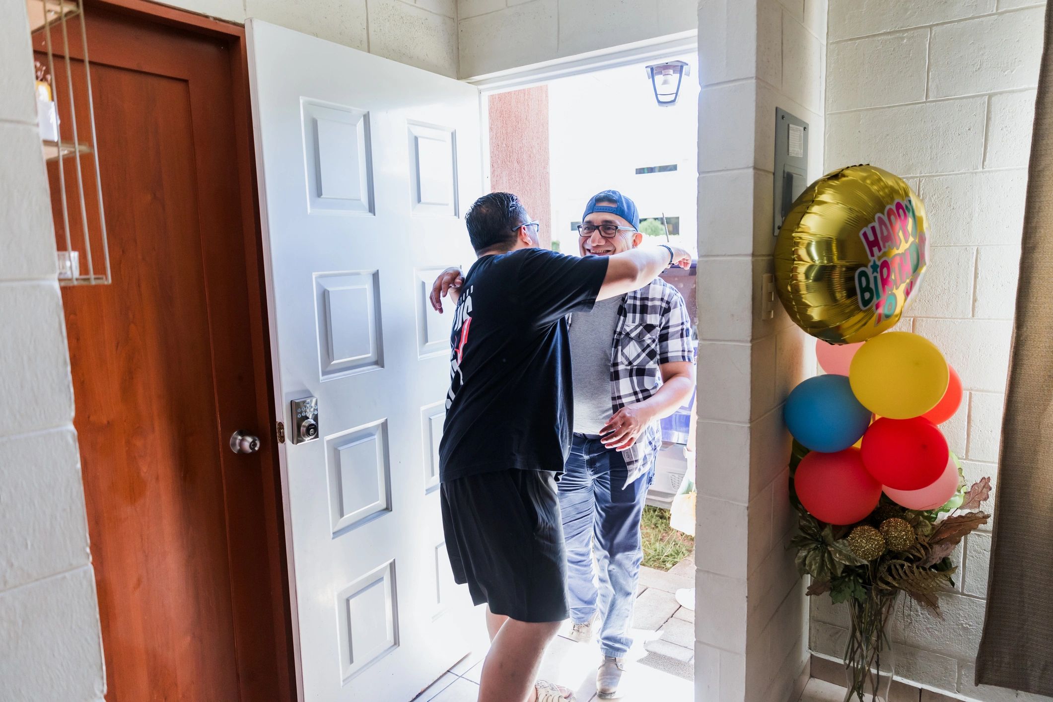 Satisfied homeowner at the front door